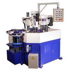 Auto feeding rotary index multistation vertical processing machine